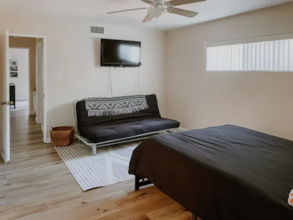 Western-styled bedroom with rustic decor at San Diego Trail Company's Airbnb ranch in Poway, CA