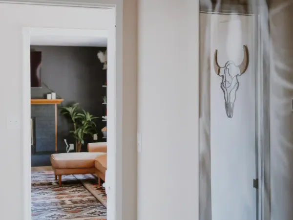 Western-styled bedroom with rustic decor at San Diego Trail Company's Airbnb ranch in Poway, CA